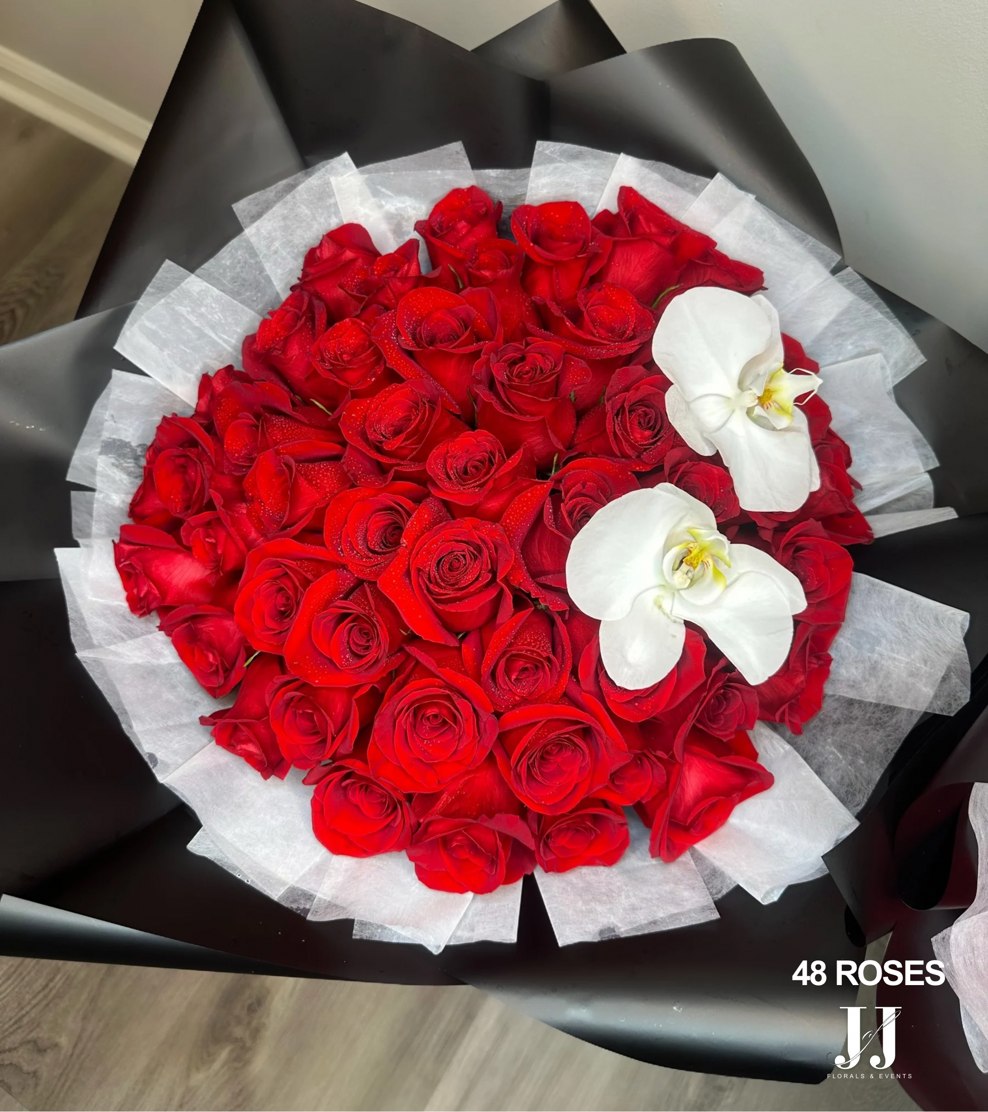 Roses By The Dozen